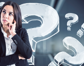 Mulher em dúvida sobre a reforma tributária.